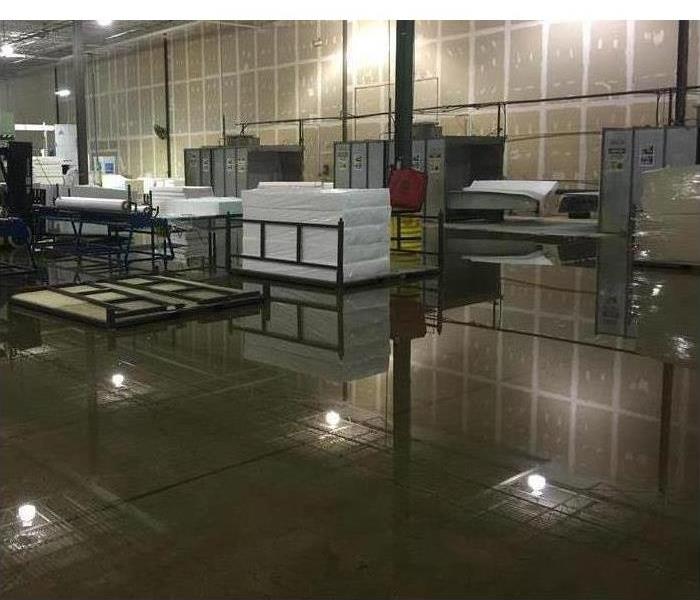 Flooded commercial building, wet floor